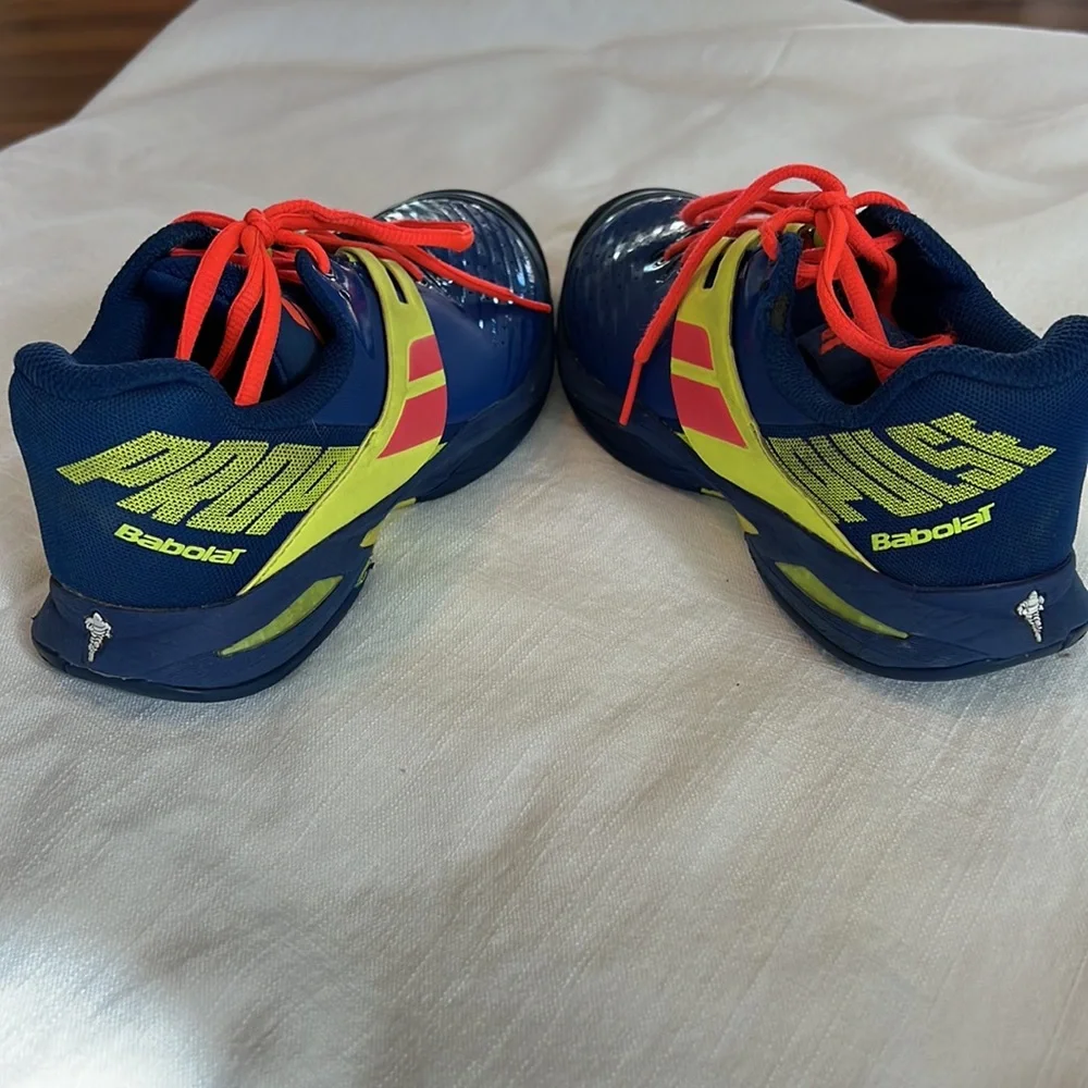 Babolat boy tennis shoes.  Size 5